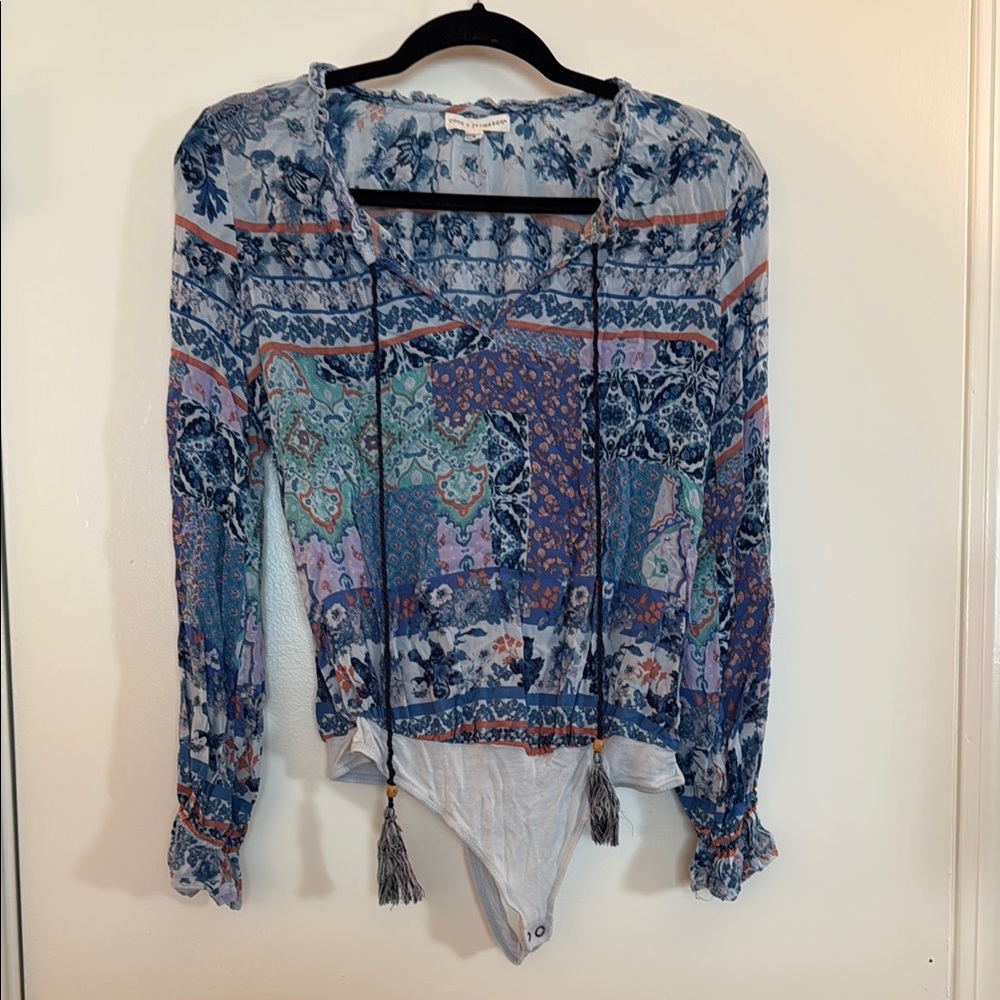 Francesca’s Floral Patchwork Long Sleeve Bodysuit